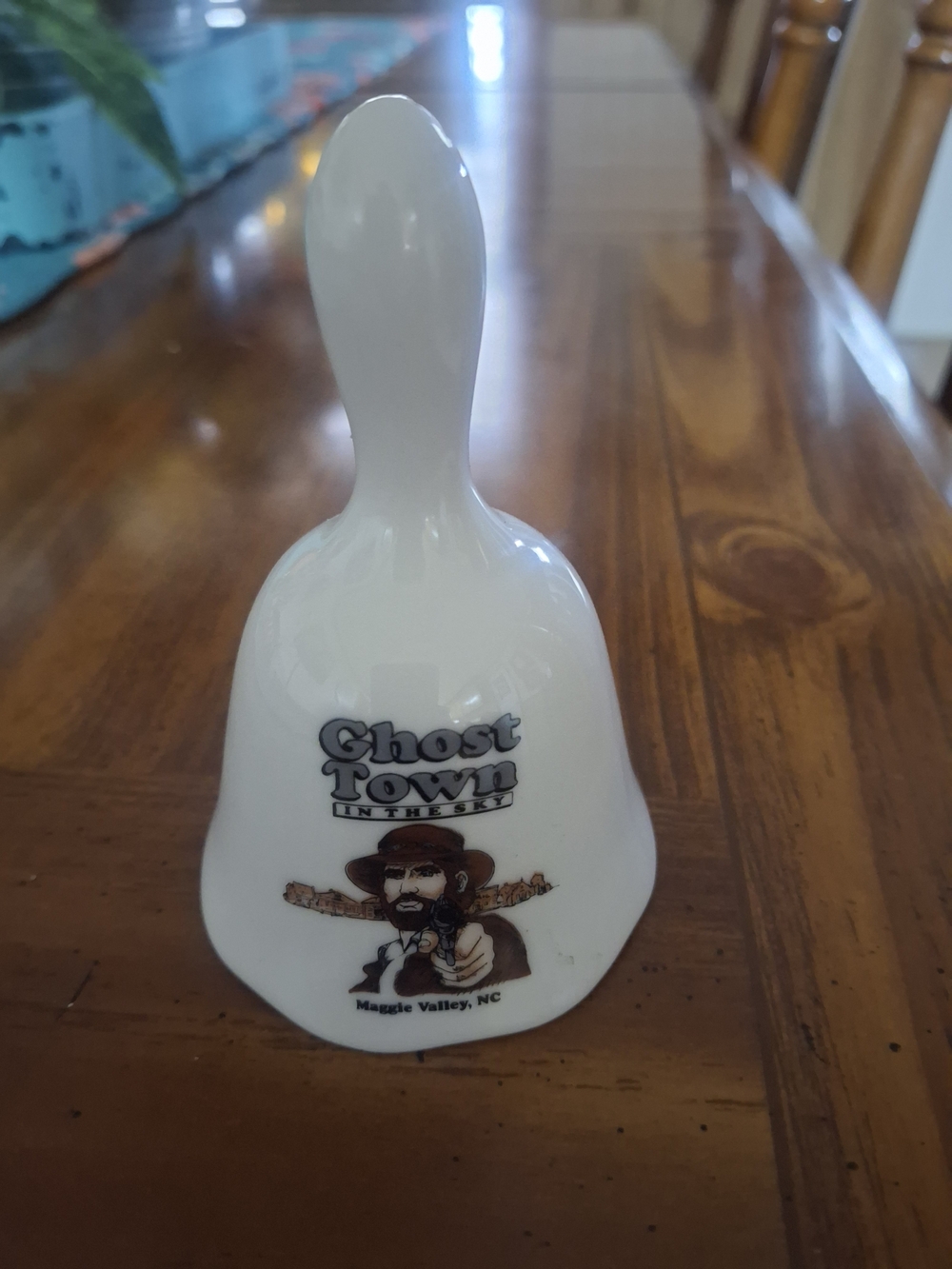 Ghost Town In The Sky Souvenir Bell - White